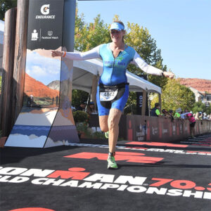 Laurie Rose crossing the finish line at the Ironman 70.3 World Championships